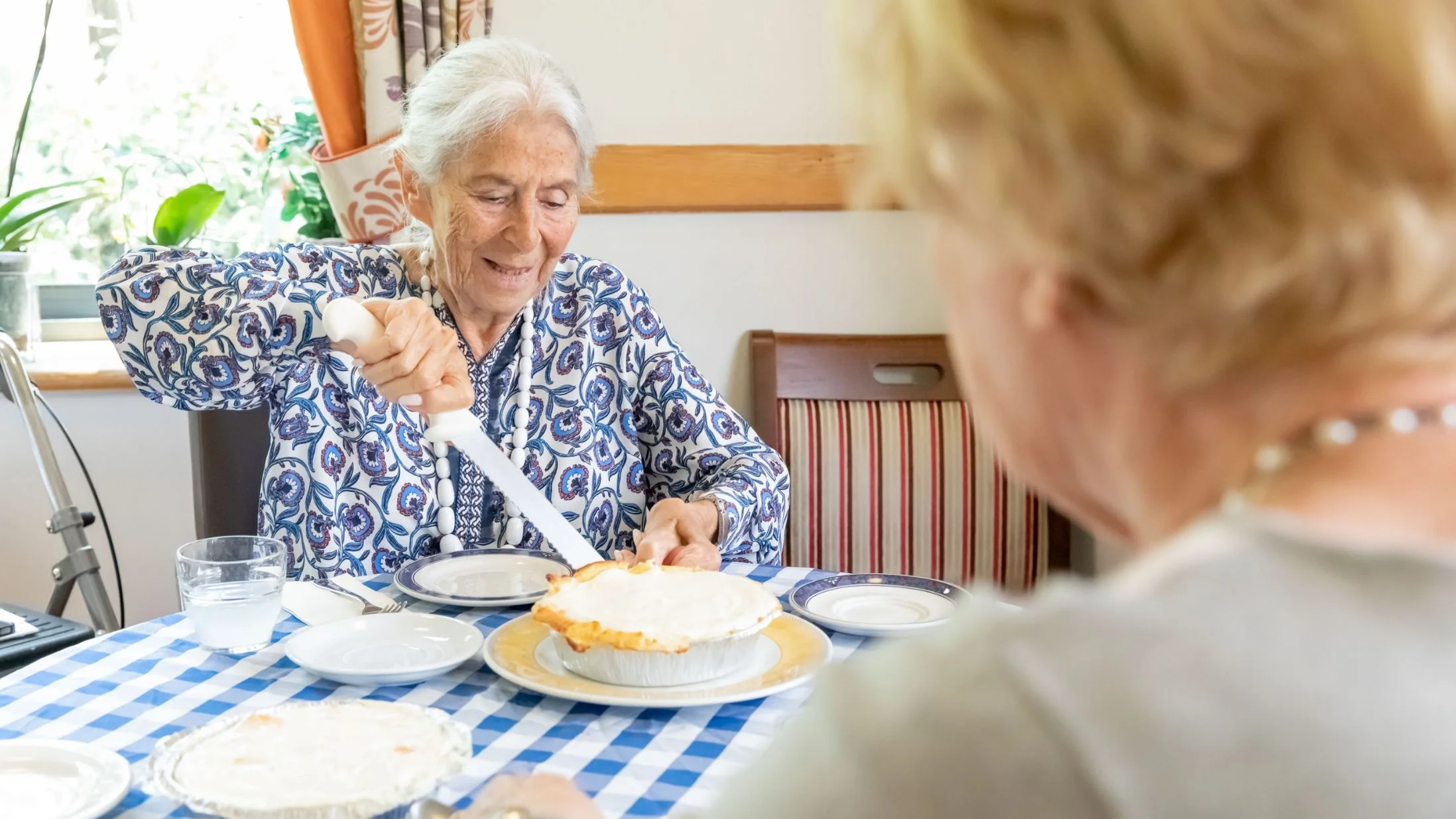 Kun Mor care home resident with pie